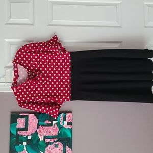 Polka-dot dress with ruffle sleeves and bow necktie details